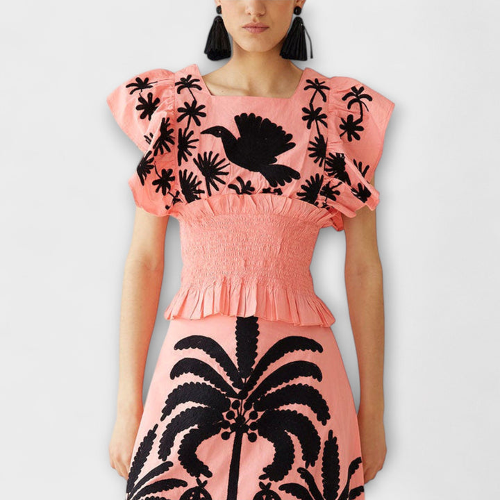 Stilfuld Tanktop med palme- og tropisk fugl design