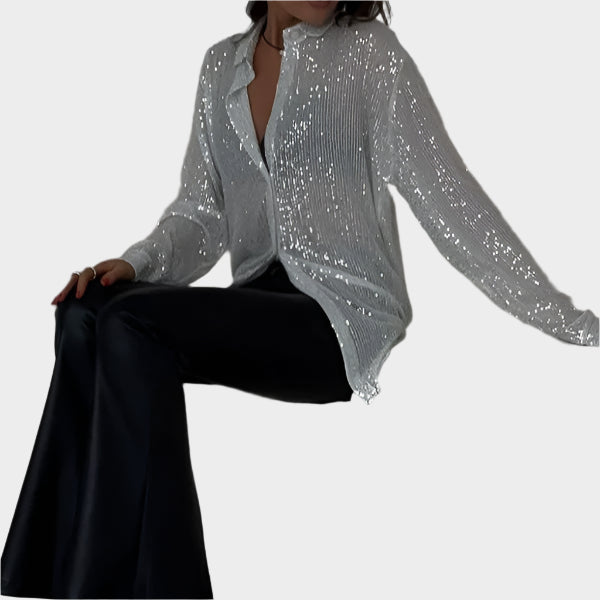Glitrende bluse til fest