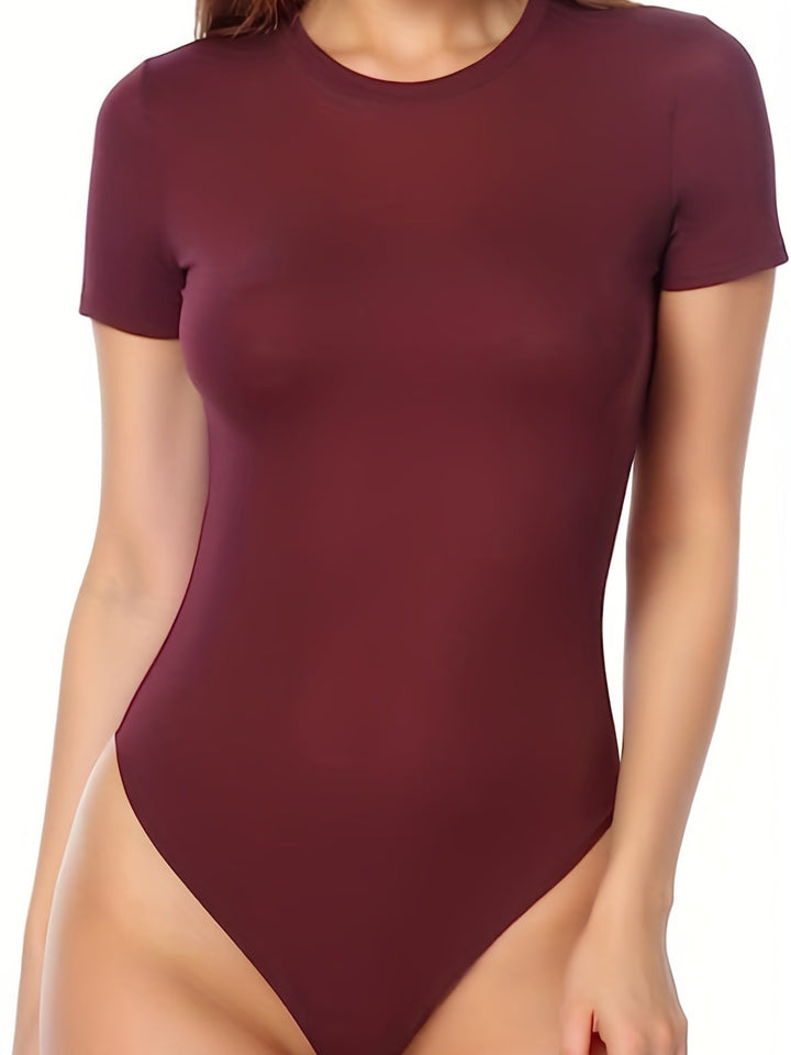 Afslappet bodysuit