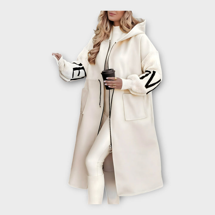 Elegant Lang Frakke med Moderne Detaljer