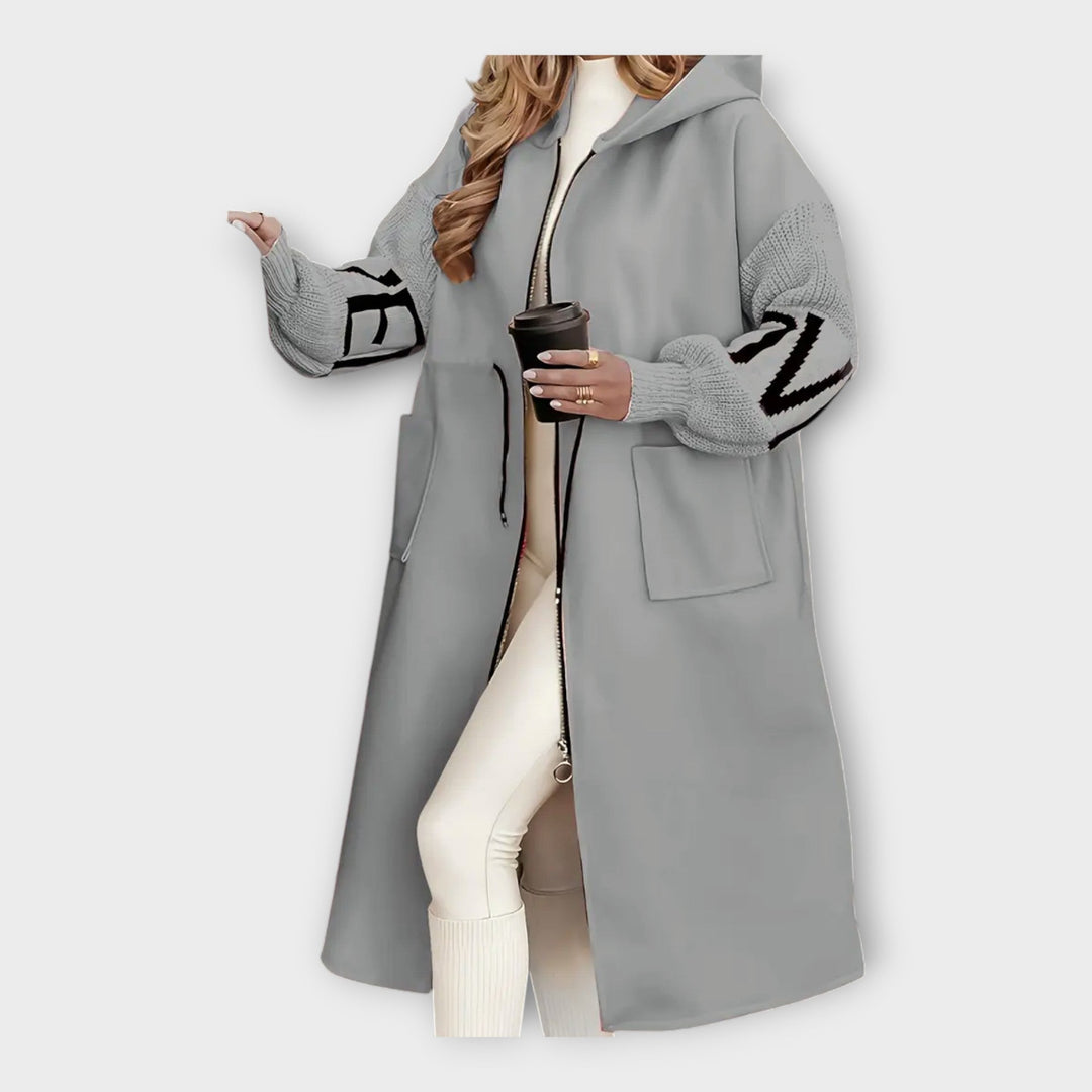 Elegant Lang Frakke med Moderne Detaljer