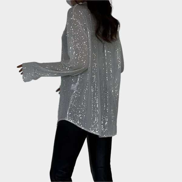 Glitrende bluse til fest