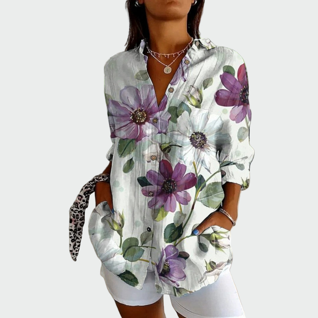 Stilfuld bluse med blomsterdesign