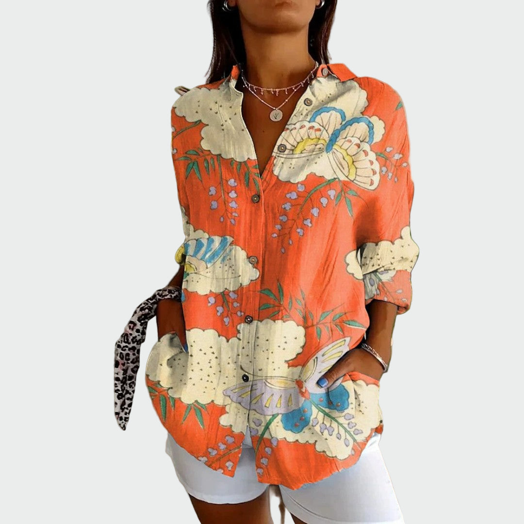 Stilfuld bluse med blomsterdesign