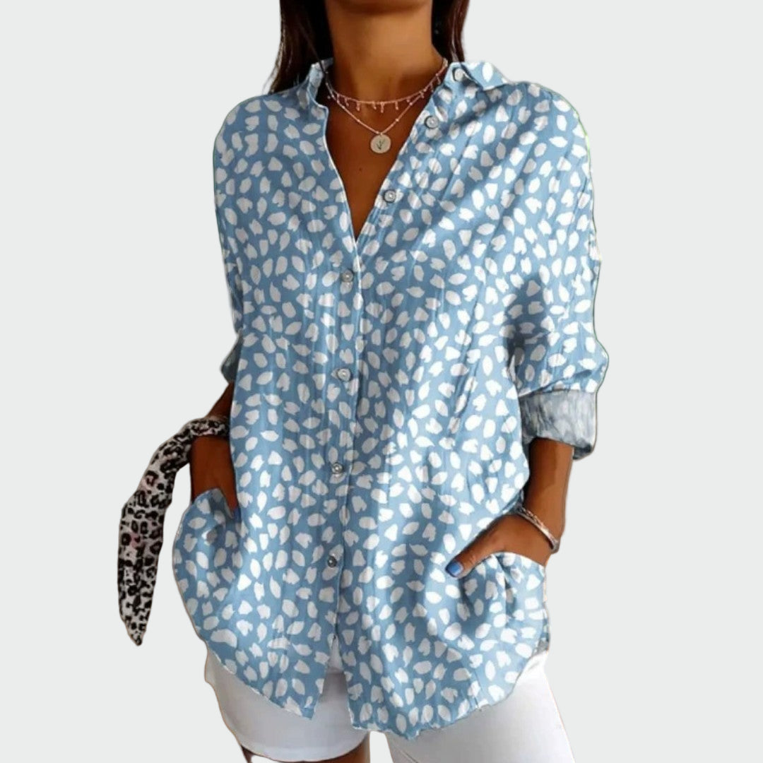Stilfuld bluse med blomsterdesign
