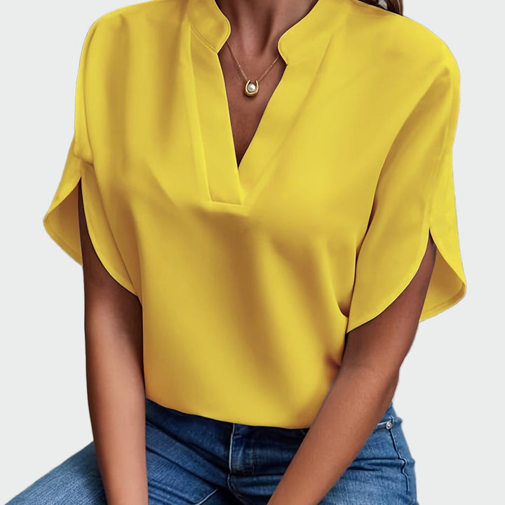 Bluse med draperet design