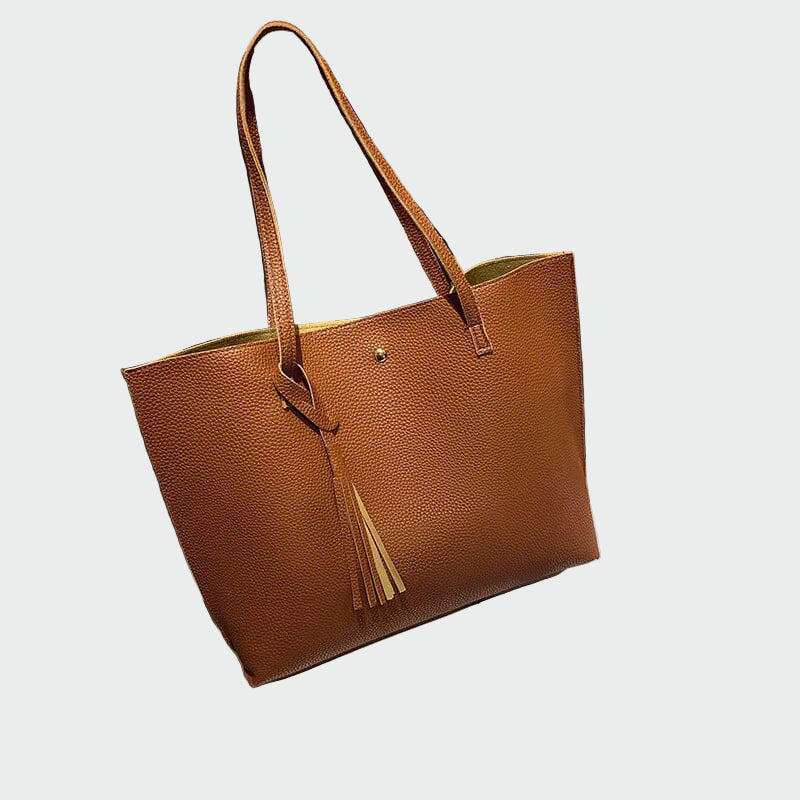 Tidløs læderhåndbagage
