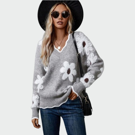 Alma – Elegant V-hals bluse med blomster­mønster